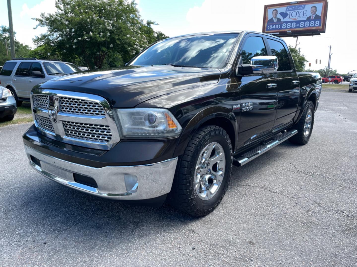 2013 BROWN RAM 1500 LARAMIE (1C6RR6NT8DS) with an 5.7L engine, Automatic transmission, located at 5103 Dorchester Rd., Charleston, SC, 29418-5607, (843) 767-1122, 36.245171, -115.228050 - Clean CarFax (no accidents reported!) Leather, Navigation, Backup Camera, CD/Sat/Bluetooth, Dual Climate Control, Power Everything (windows, locks, seats, mirrors), Heated/Cooled Seats, Heated Rear Seats, Heated Steering Wheel, Power Sliding Rear Window, Power Inverter, Push Button Start, Keyless E - Photo#2